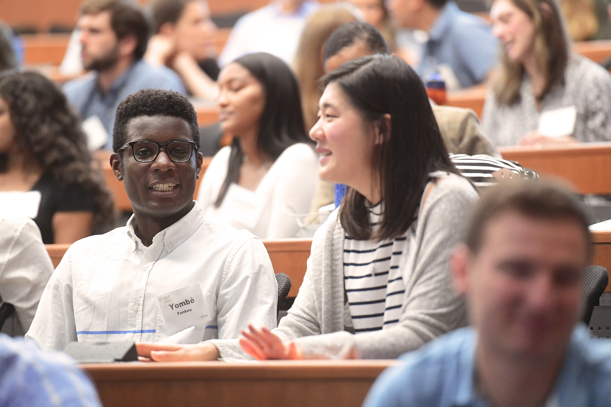 Students in large lecture hall