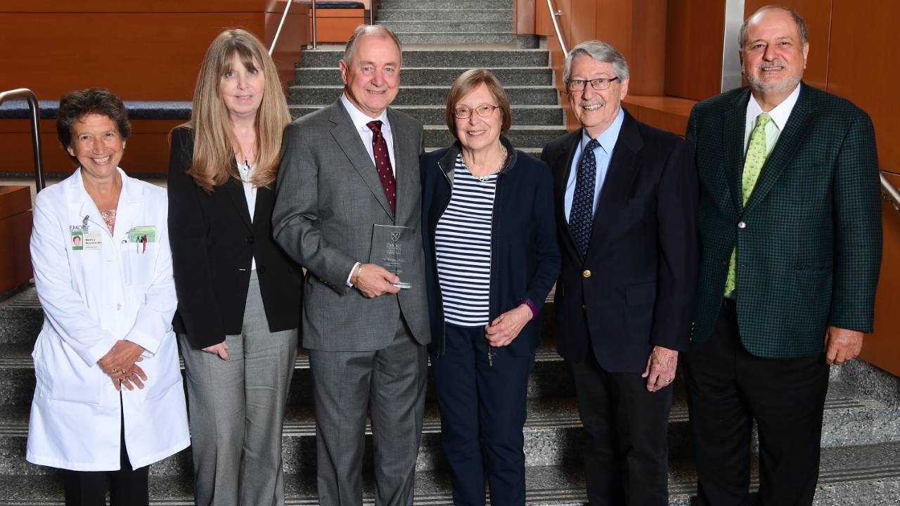 Faculty member receiving an award