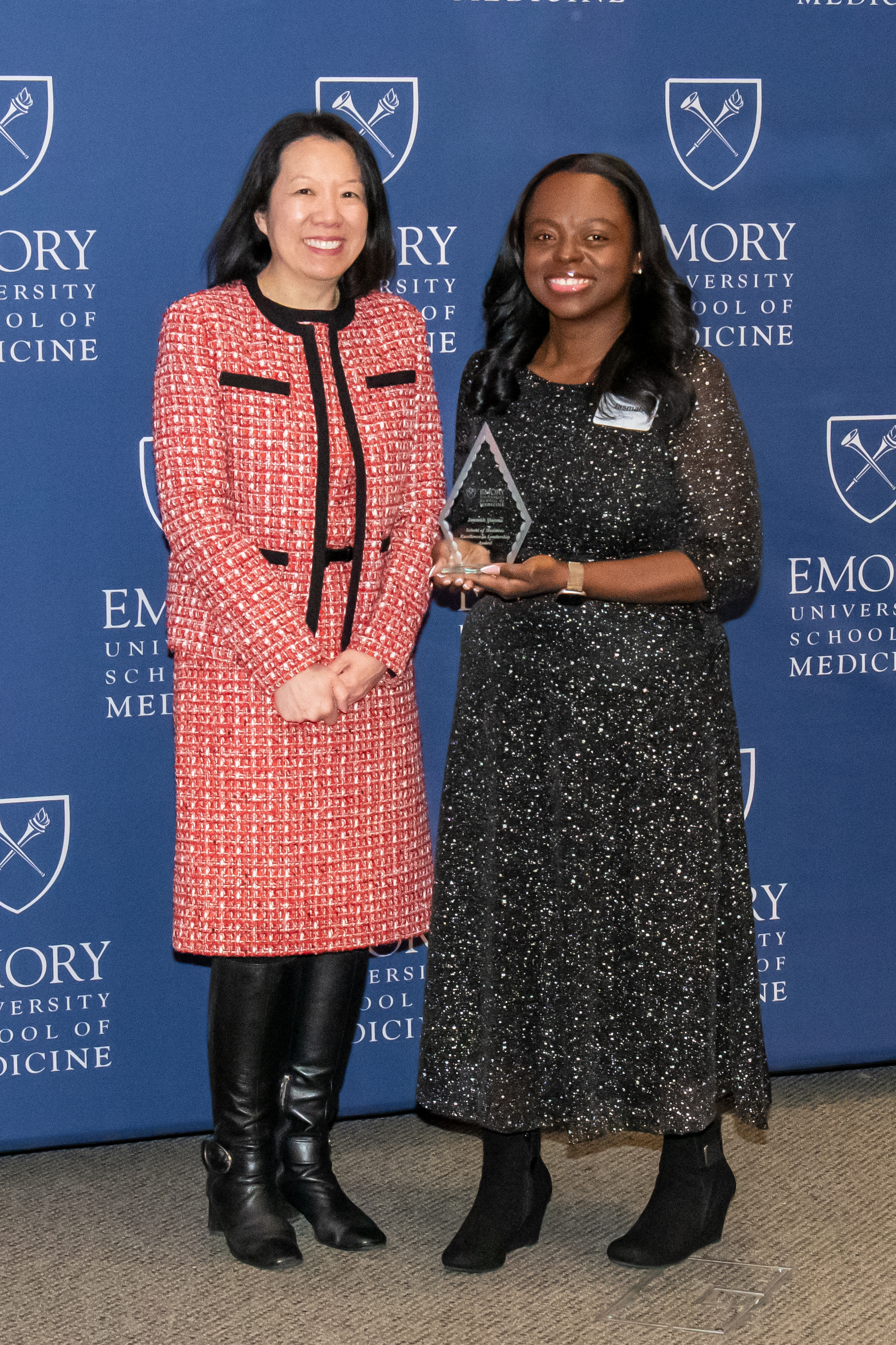 Jasmah Hanna accepting her award with Dean Wong.