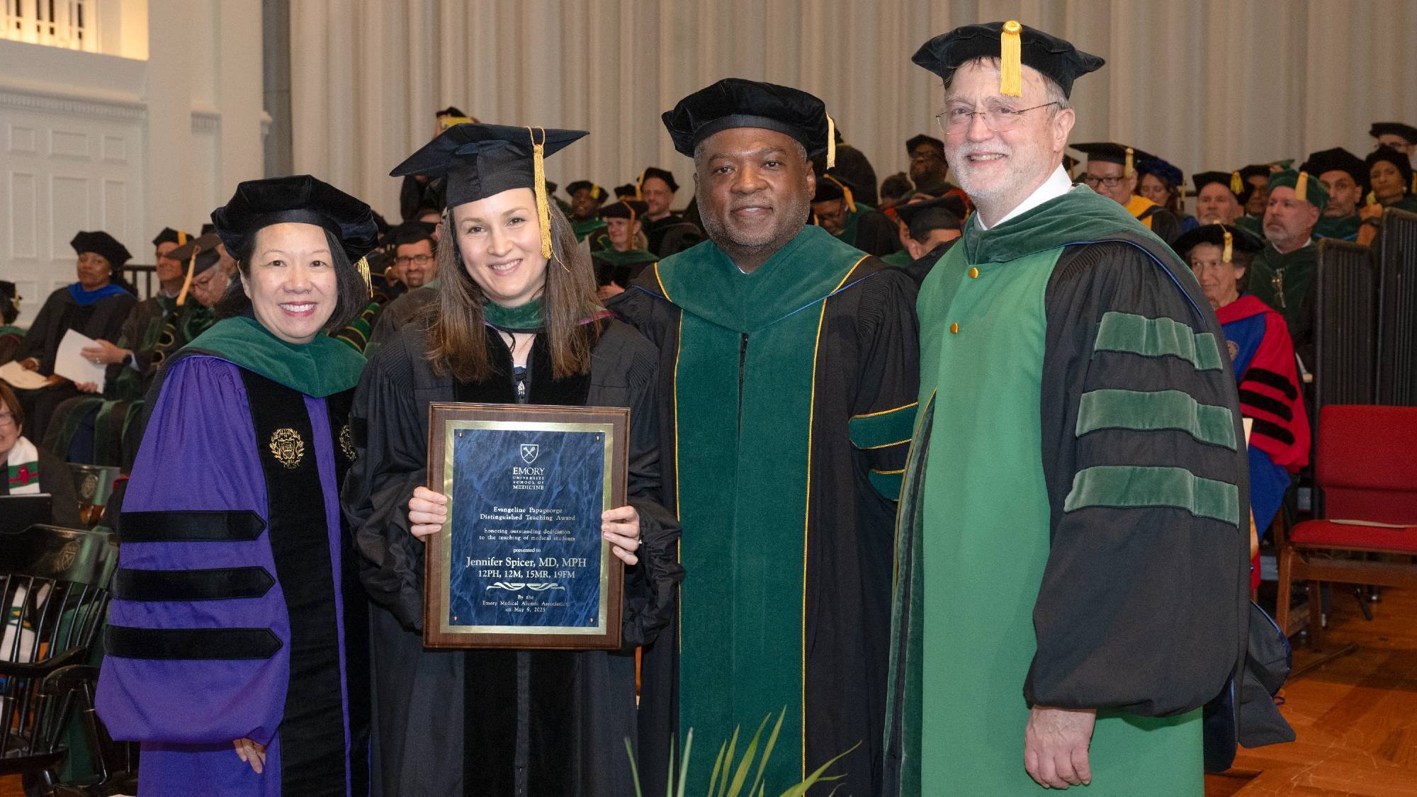 Dean and leadership in cap and gown