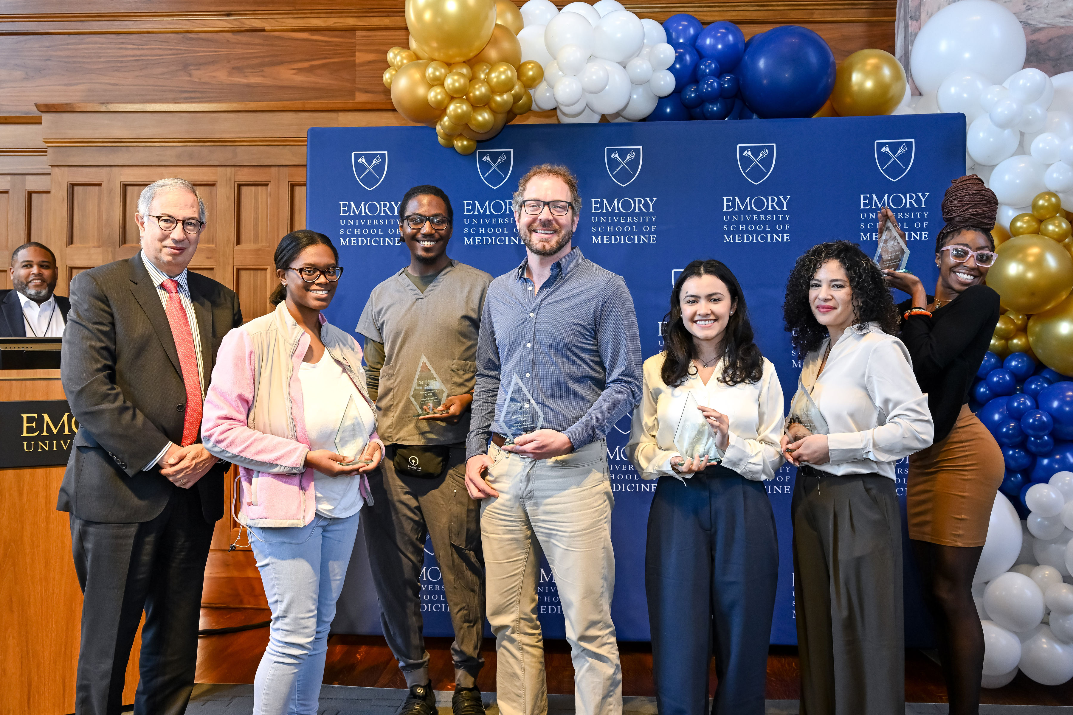 Emory Laboratory for Innovative Assay Development (ELIAD) team members accept their awards