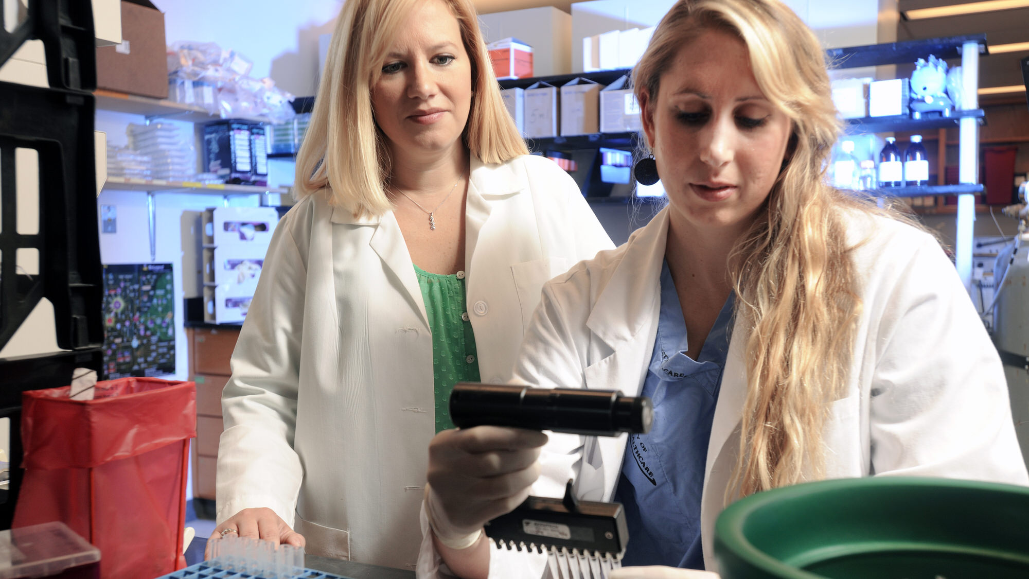 Student and faculty in lab