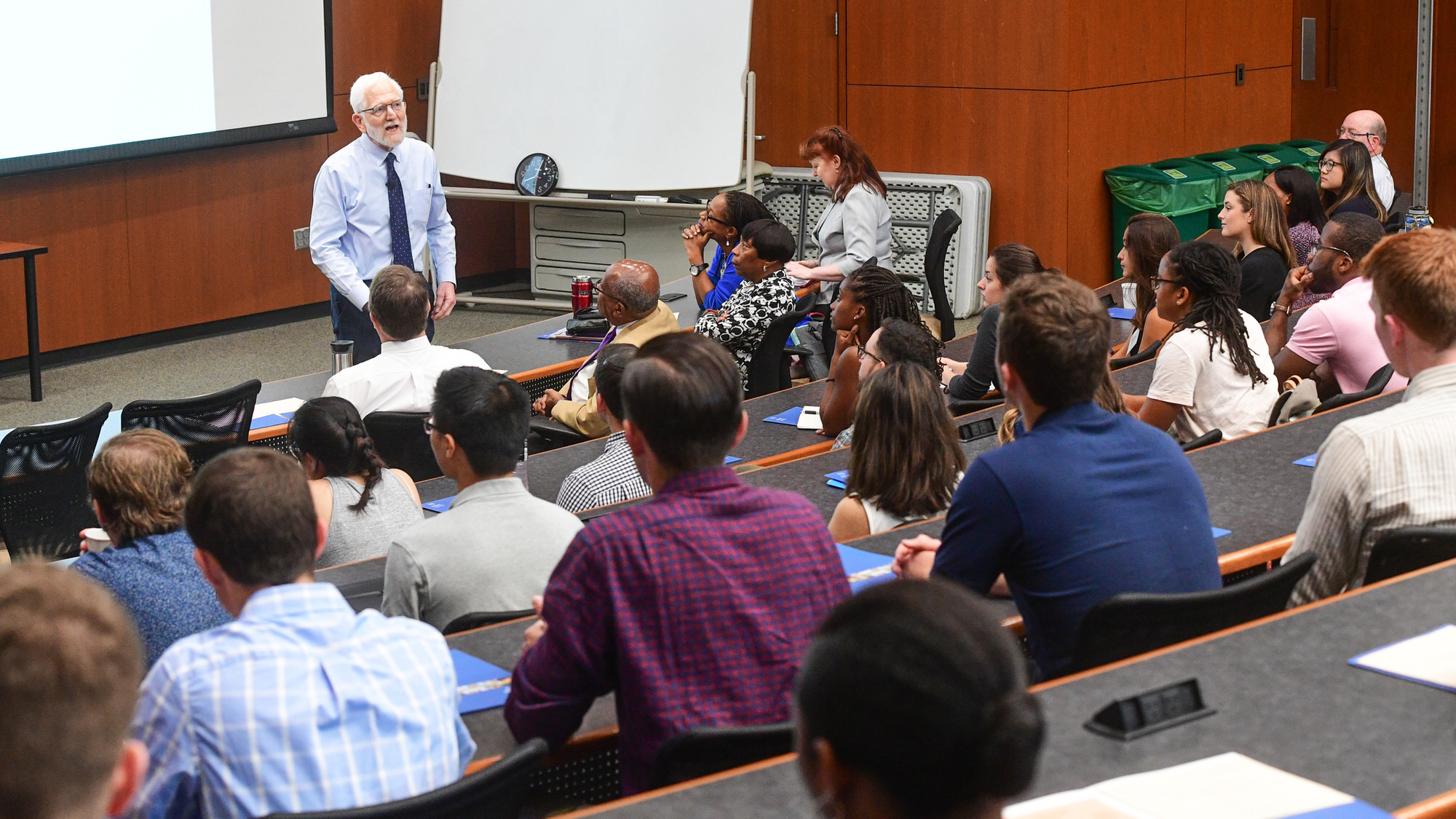 Faculty member teaching in auditorium