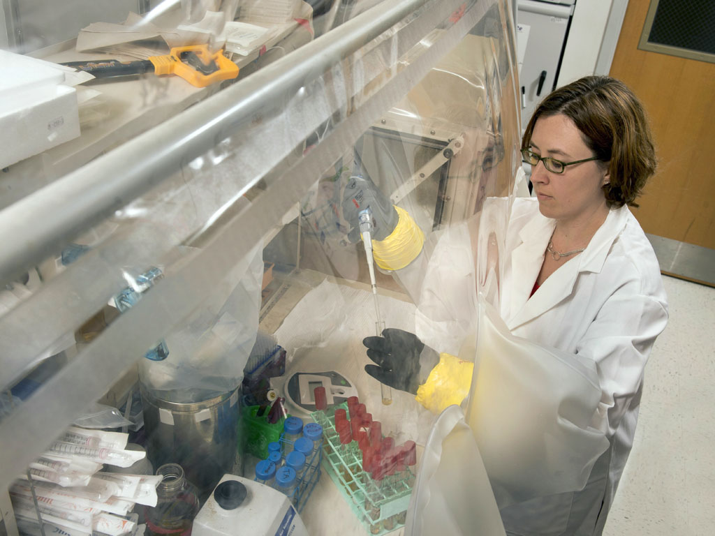 Woman works in a lab. 