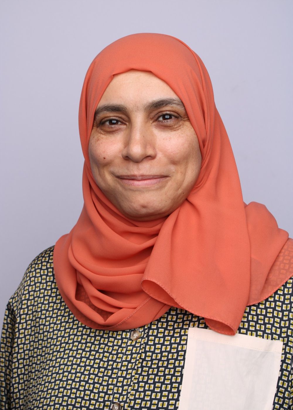 Badria Alhatali, MD, FACMT