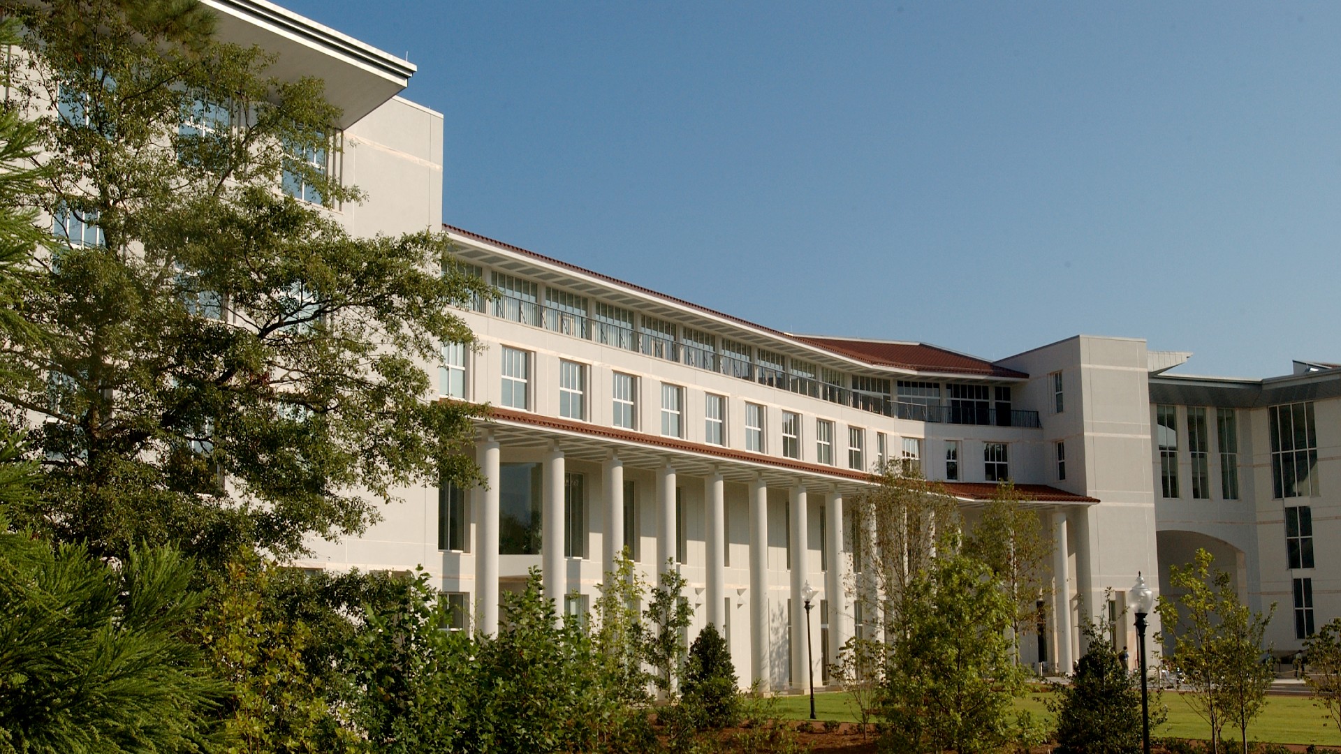 exterior of Goizueta Business School on a sunny day