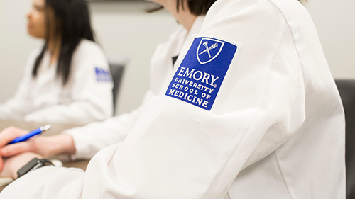 School of Medicine white coat badge