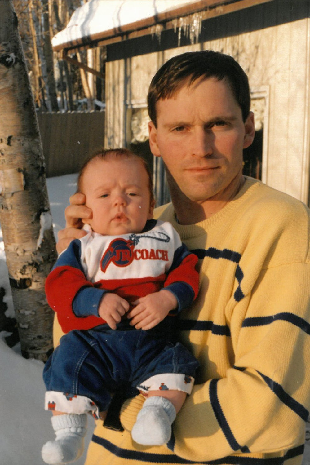 Dr. Clyde Partin and baby son Will in Alaska