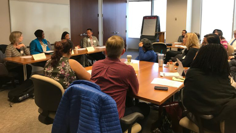 Faculty in conference room