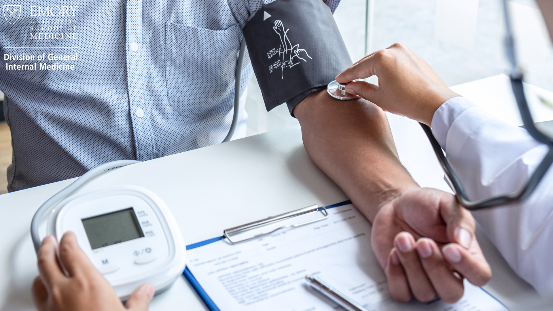 stock image of the upper torso and right arm of a man having his blood pressure checked