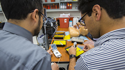 trainees in the SOM sim lab