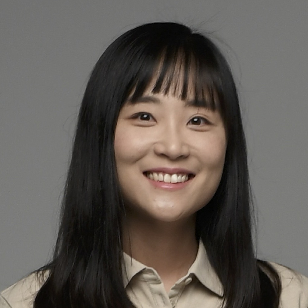 headshot of woman with black hair