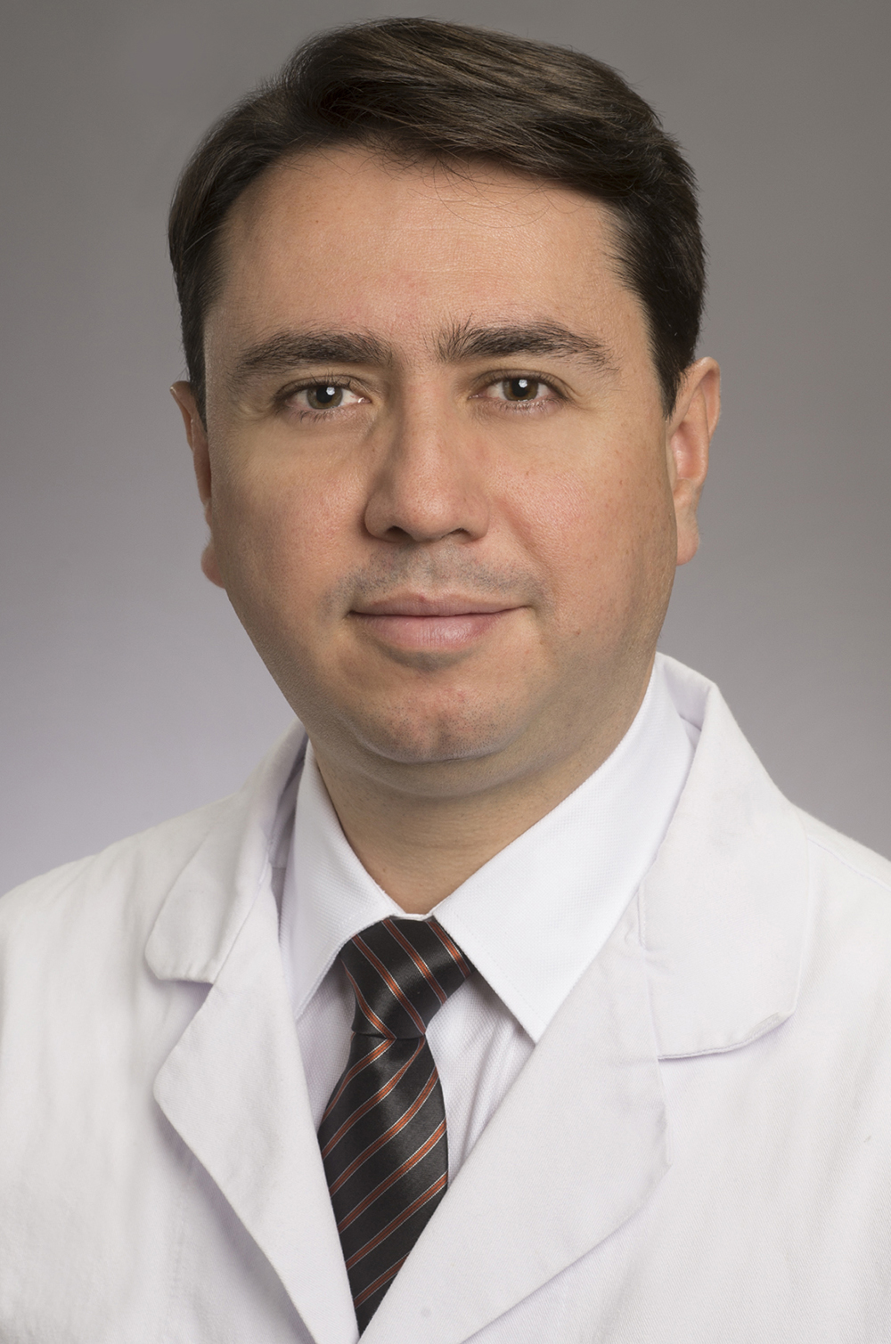 Dr. Gustavo Pradilla