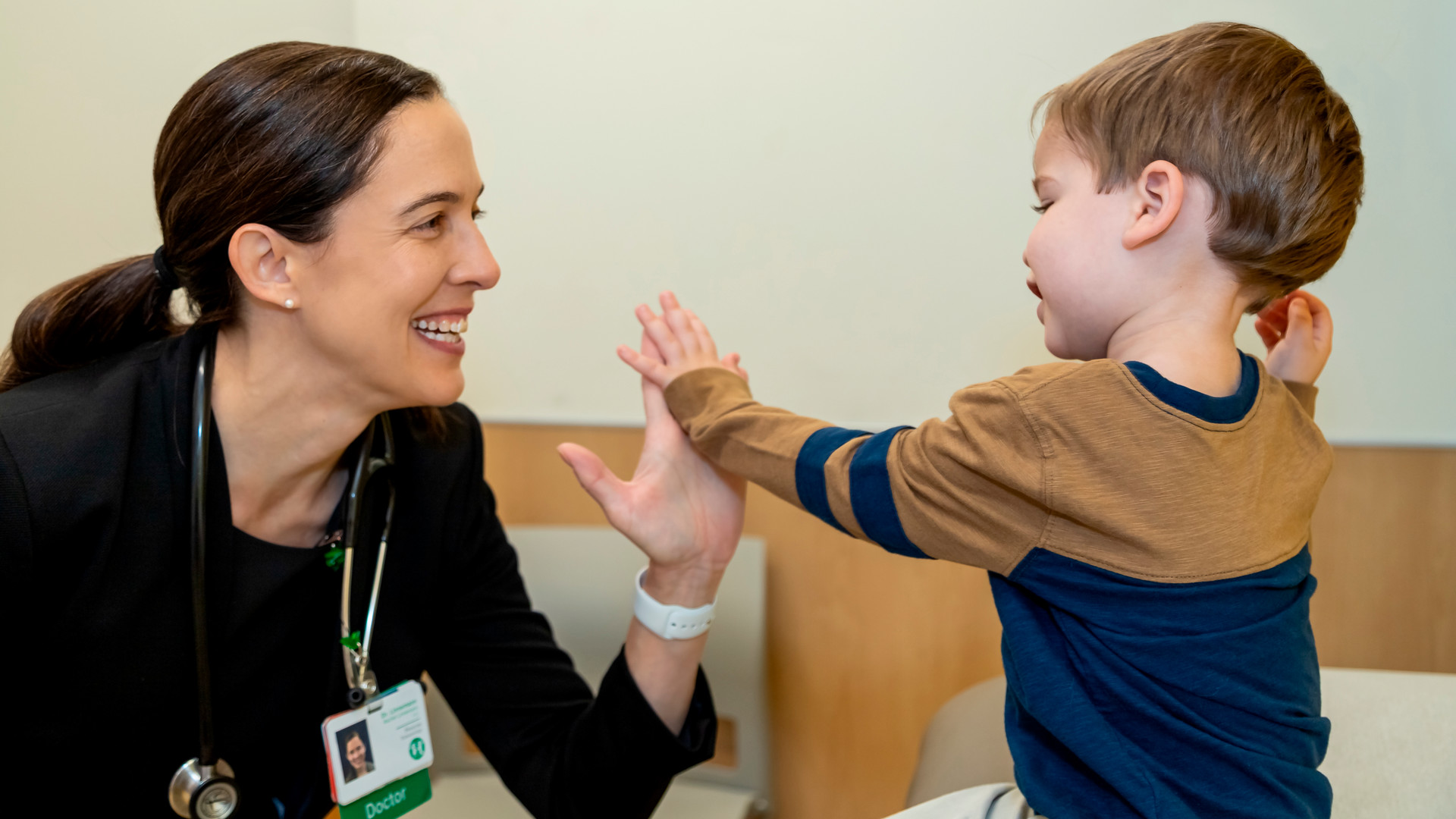 Dr. Linneman with a patient