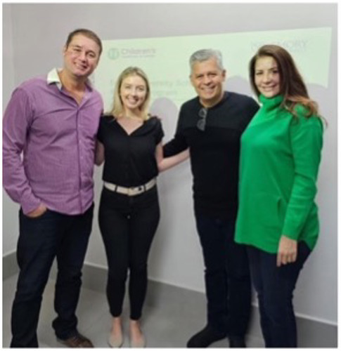 GHOPE resident Olivia and Dr. Jose Ferreria with UNIFENAS medical school leadership