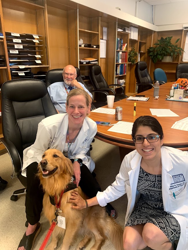 Residents and faculty with dogs