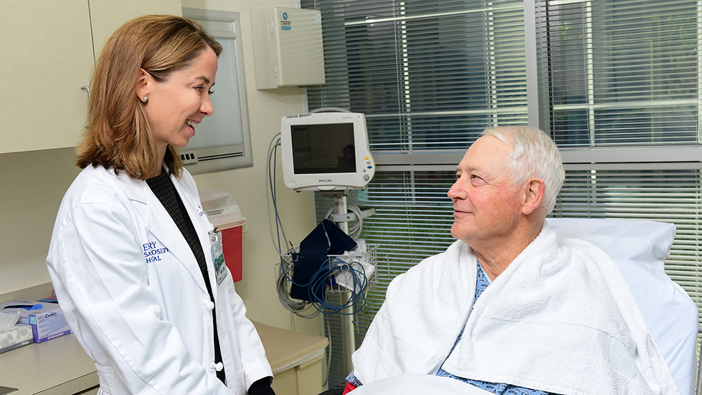 Radiation oncologist Dr. Shannon Kahn with a patient..