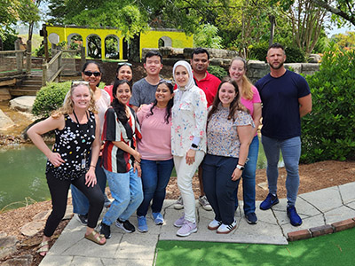 A putt putt golf lab outing in August 2024 with lab team members from Drs. Kesarwala, Orthwein and Spangle labs.