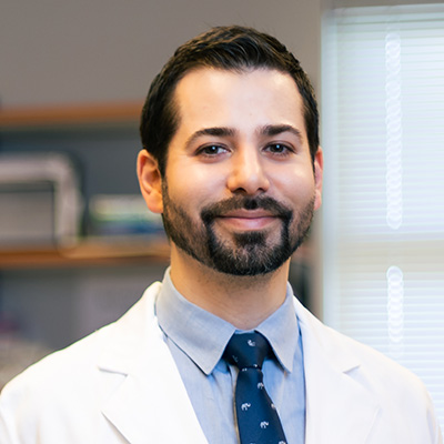 Dr. Zach Buchwald portrait in the lab