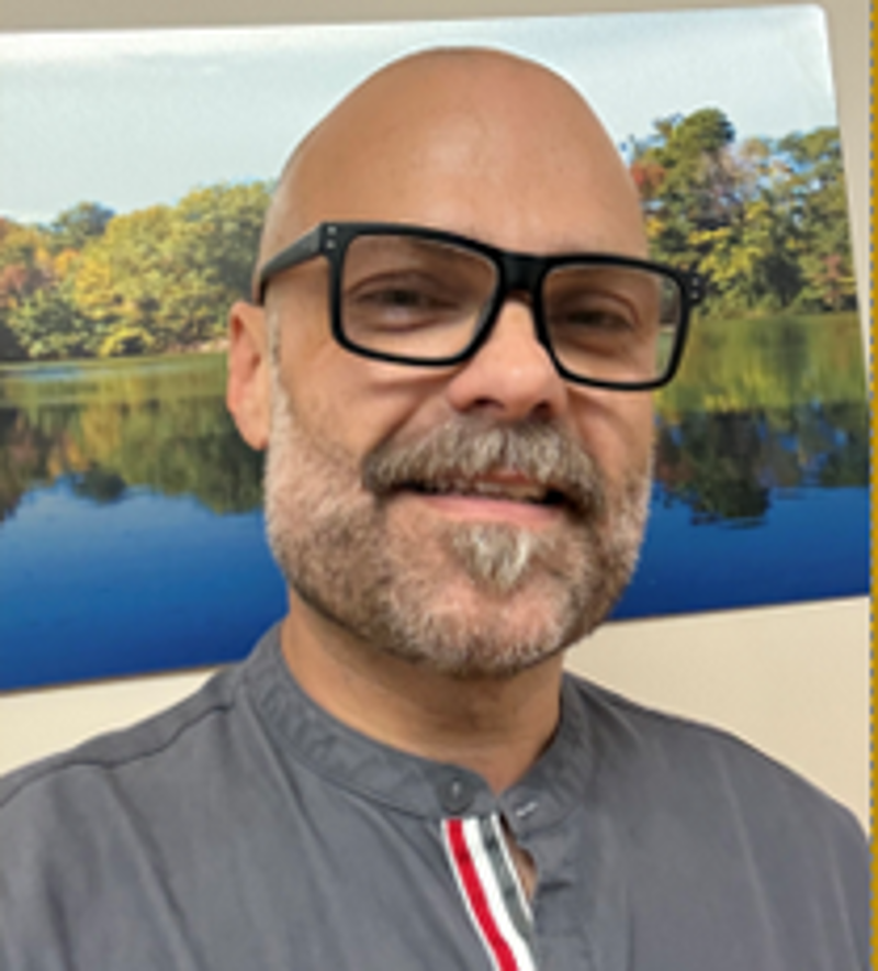 smiling technologist