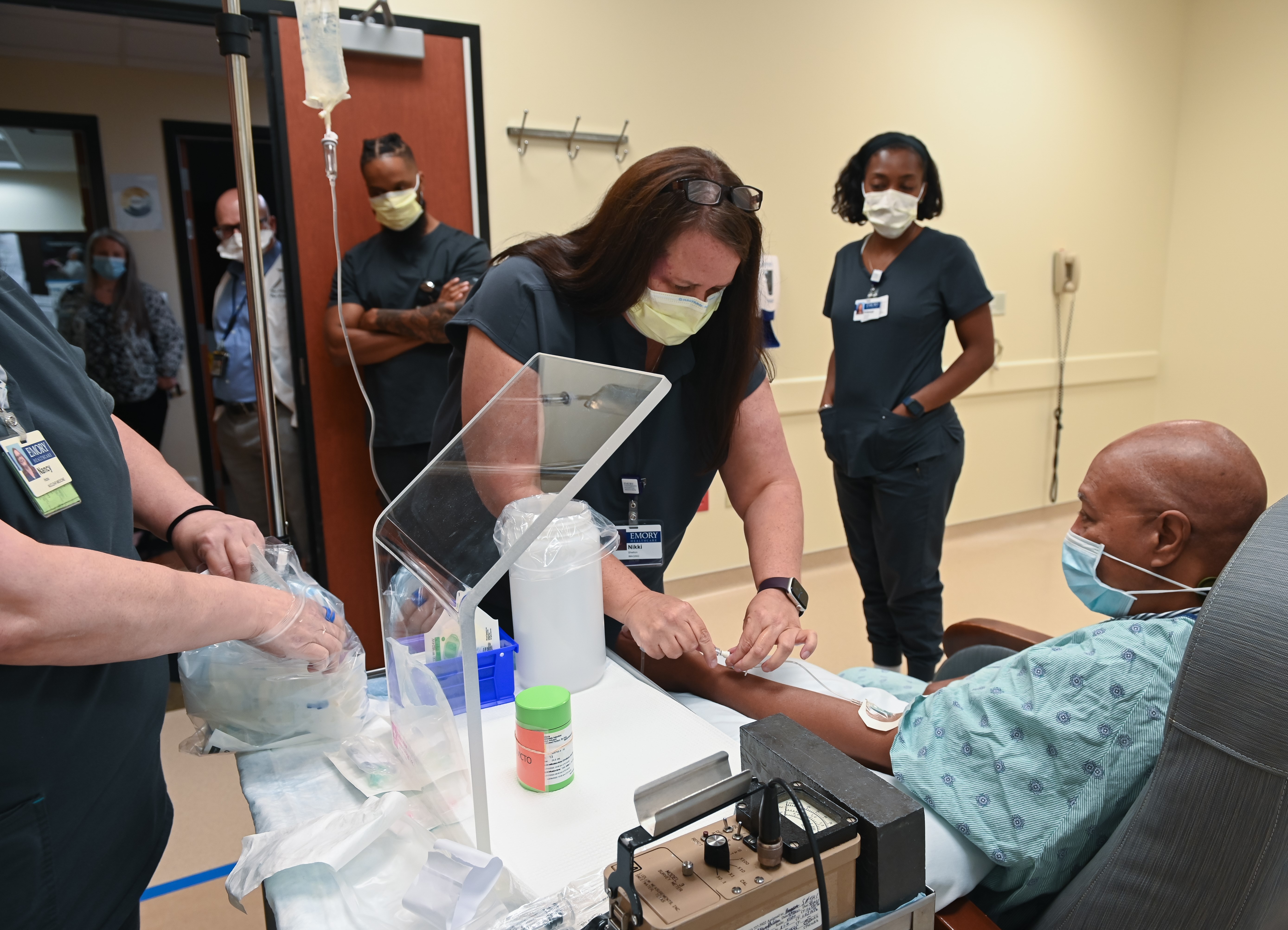 patient being prepared to receive radiotherapeutic treatment