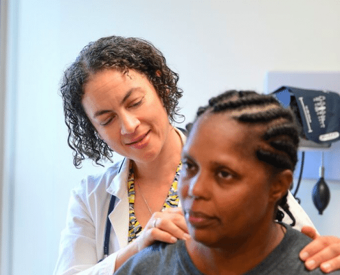 Dr. Sara Pullen with a patient