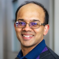 heashot of man with glasses