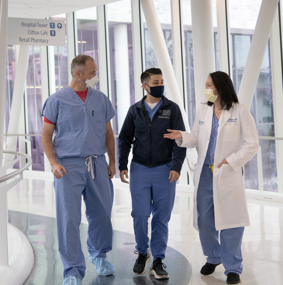 Virginia Shaffer with fellow Emory colorectal surgeon Patrick Sullivan (left) and PA Amanda Dunn (middle).