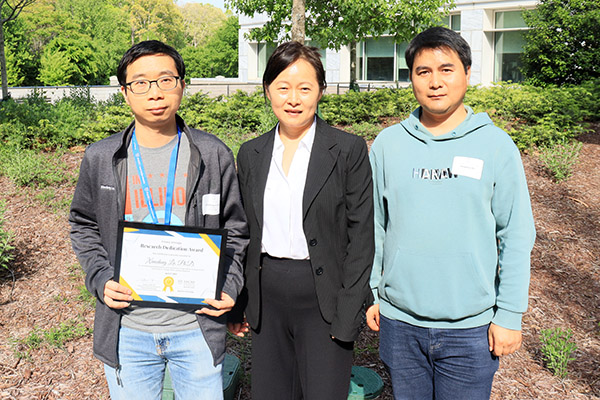 Dr. Yu with Xiaodong Lu and Shawn Shi at Urology department retreat, April 2025