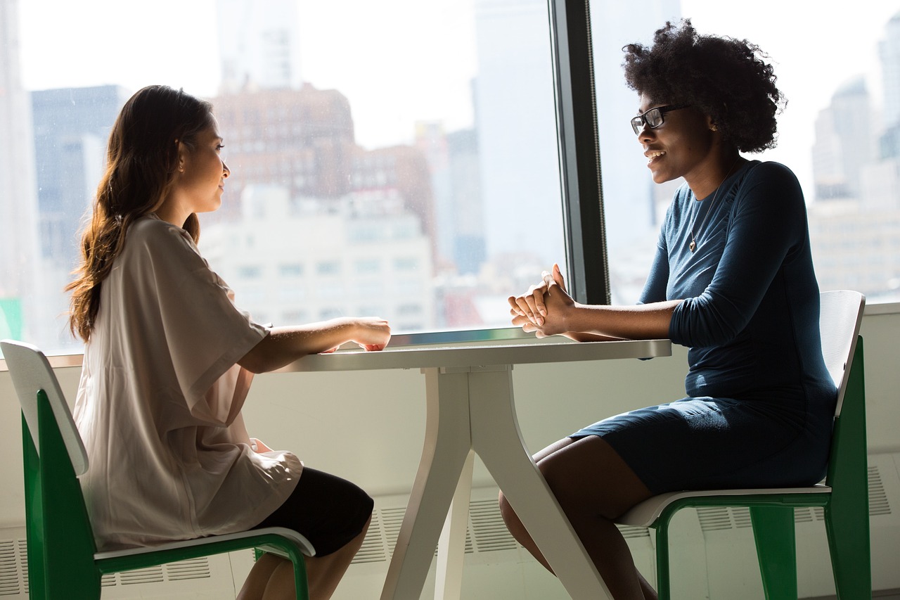 two women in conversation