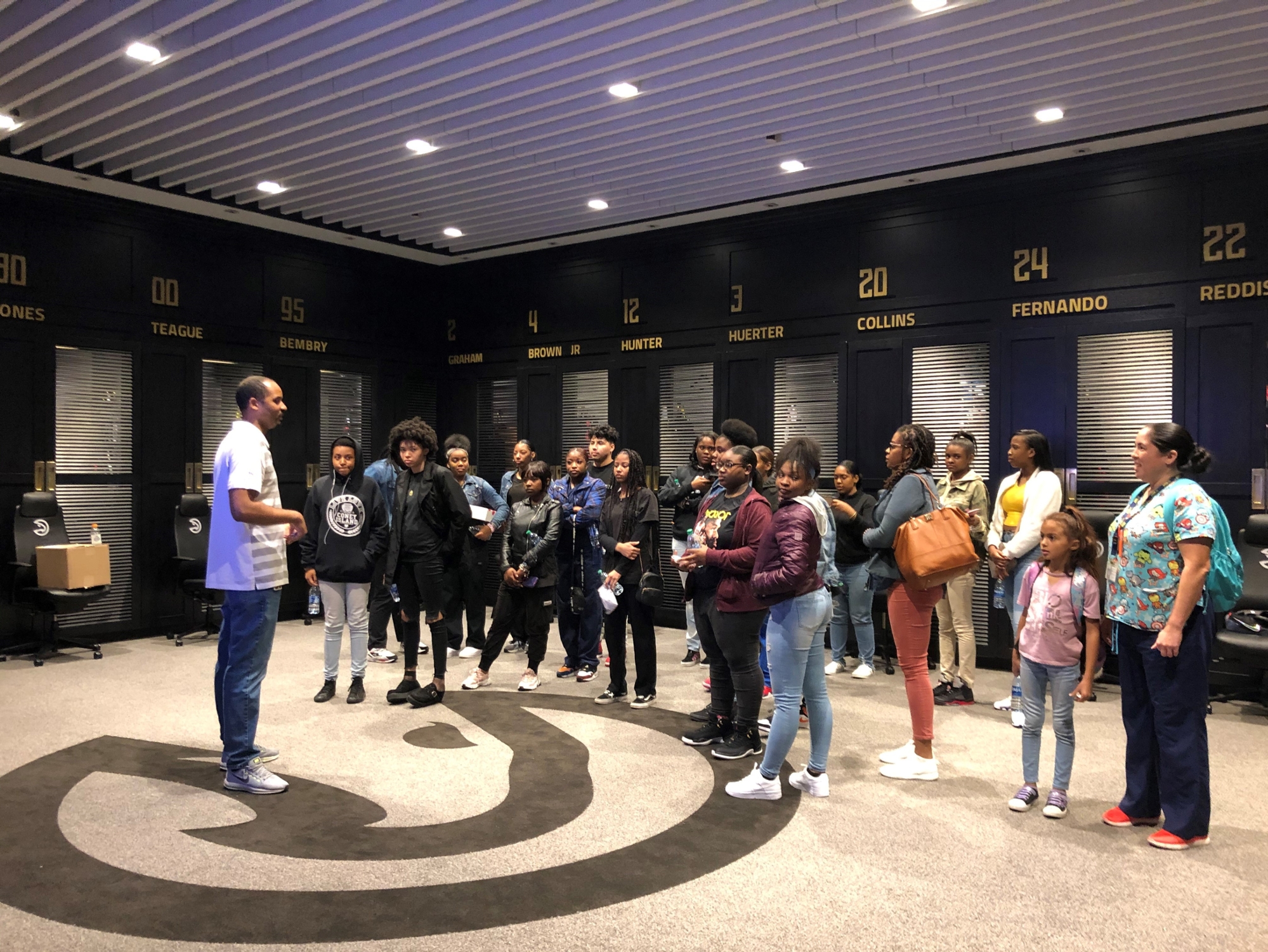 Group of students in basketball locker room