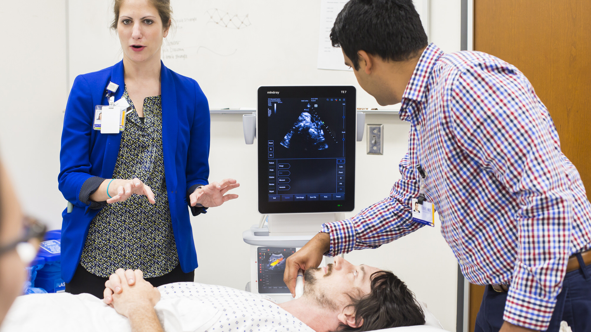 Student and faculty at the bedside