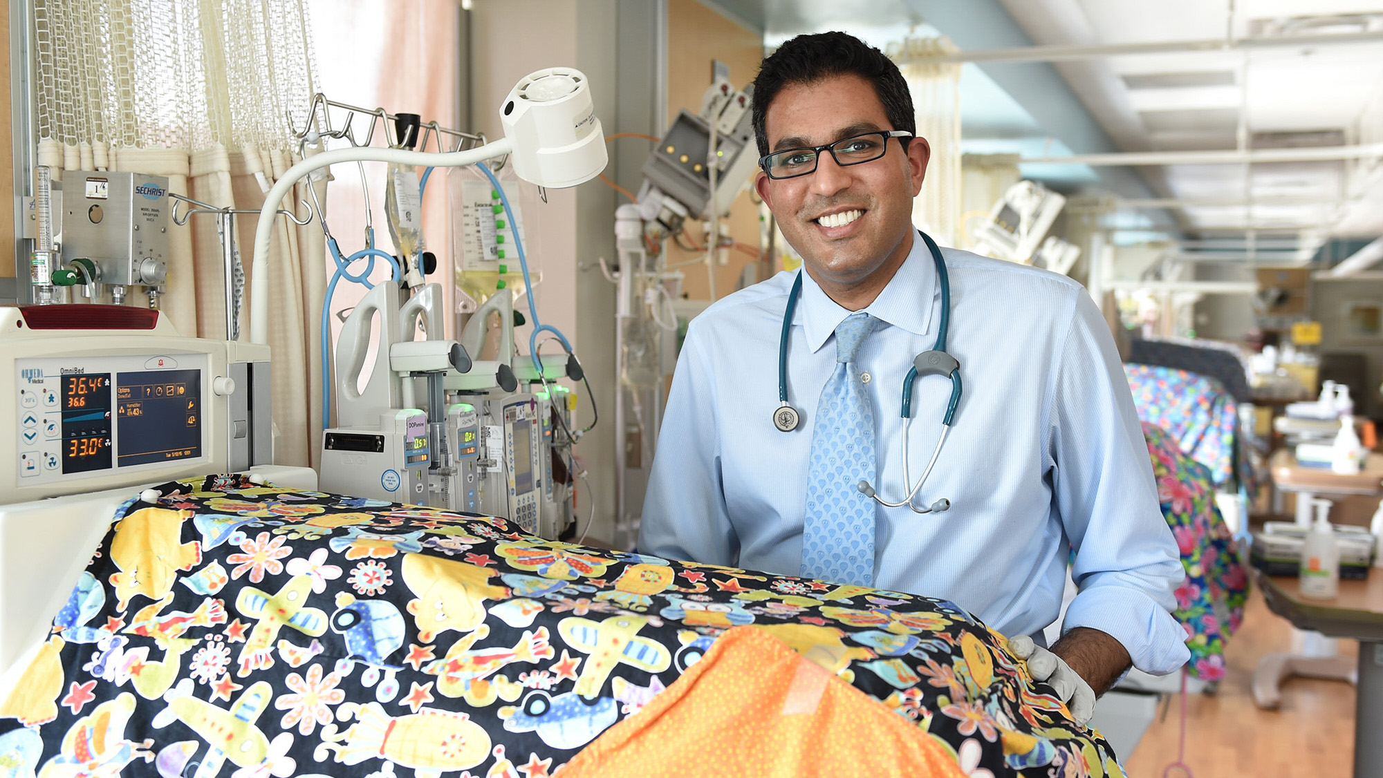 Resident at Grady NICU bedside