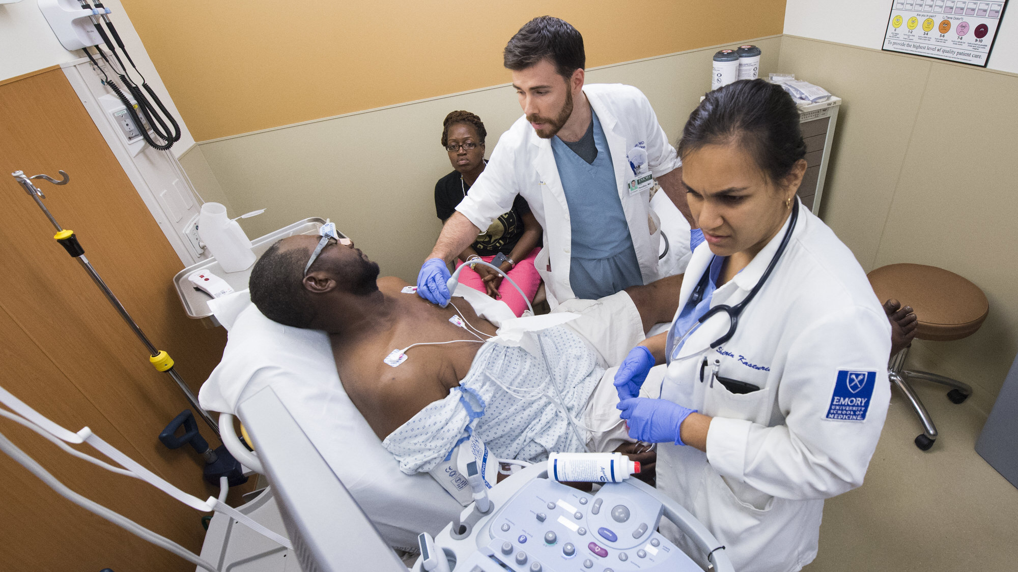 Students performing ultrasound