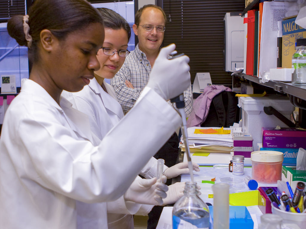 Students and faculty in a lab